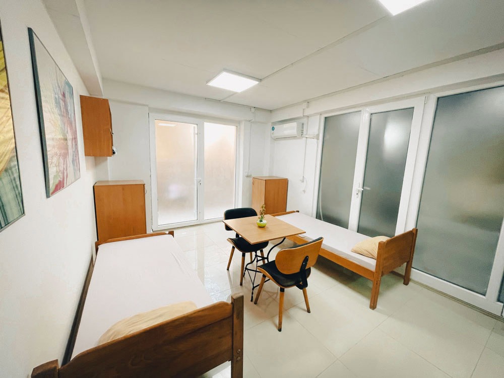 beds, tables, chairs, door, entrance,