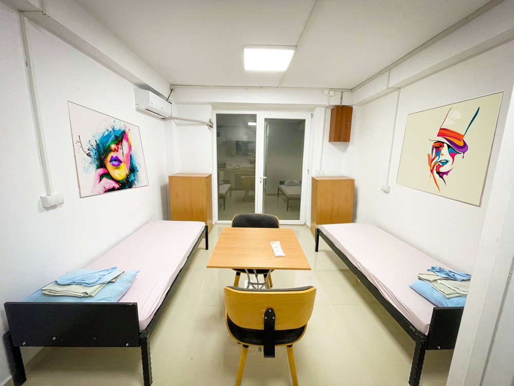 beds, tables, chairs, door, entrance,